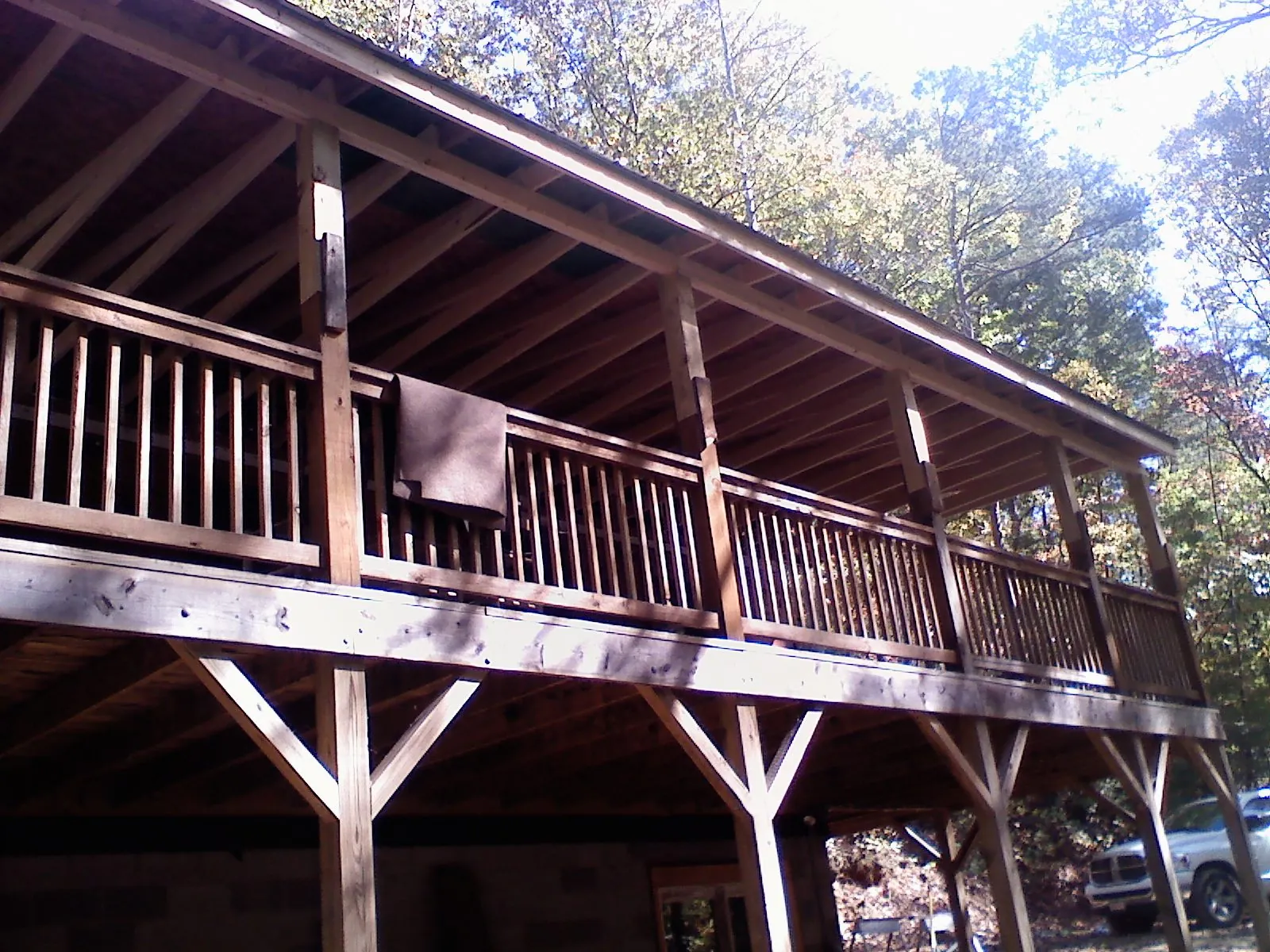 Timber framing under a new elevated porch and deck — Roof Leak Repair in Olalla by Roofing Brothers